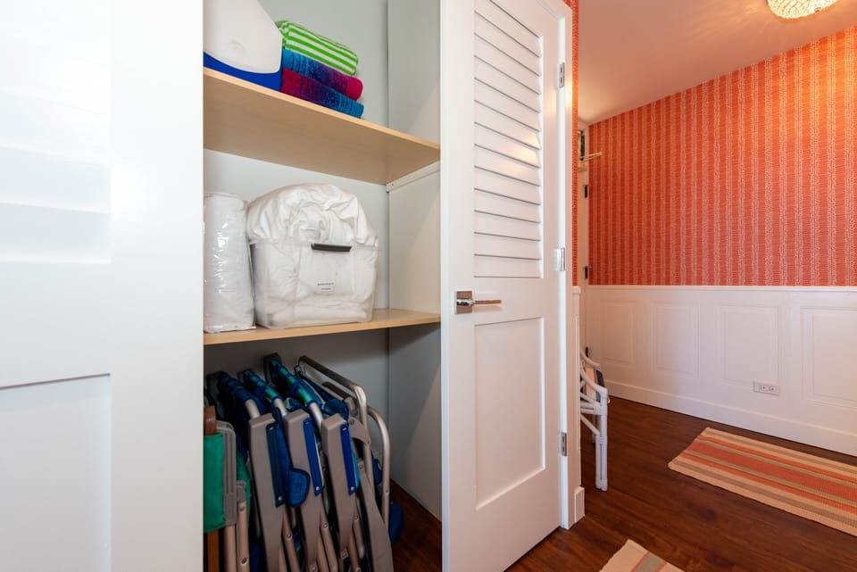 Hallway closet with beach gear
