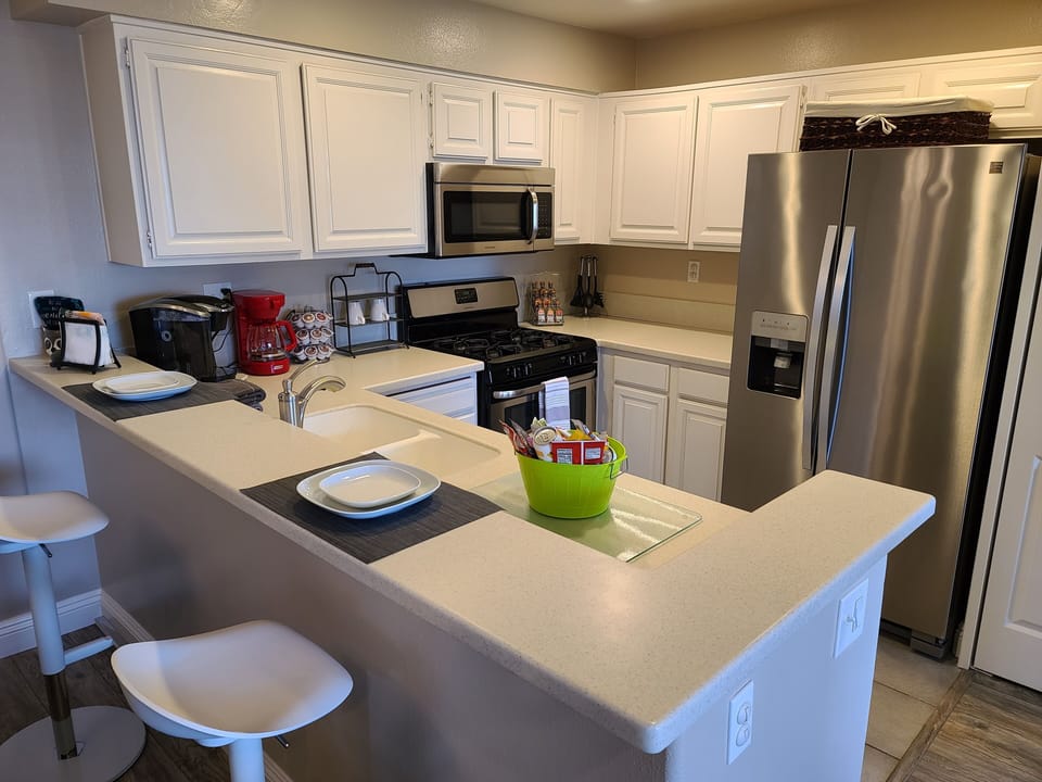 Breakfast bar with seating for 2 make this a convenient space for breakfast.