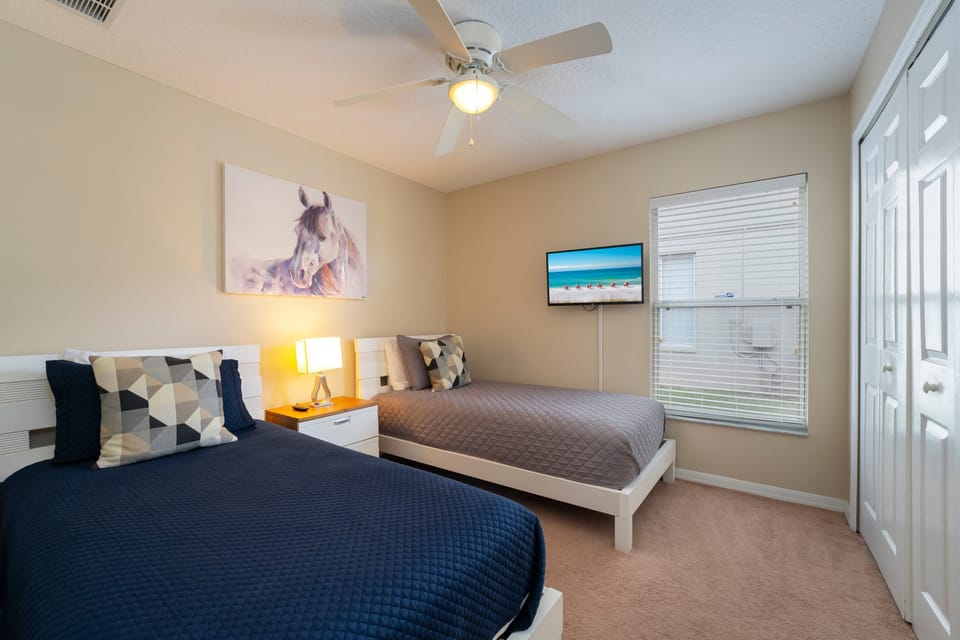 Bedroom 4 showing 2-twin beds and TV