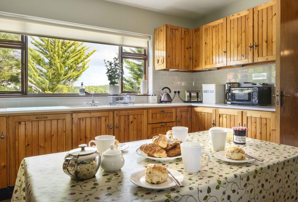 original handmade kitchen with dining tables to seat up to ten people