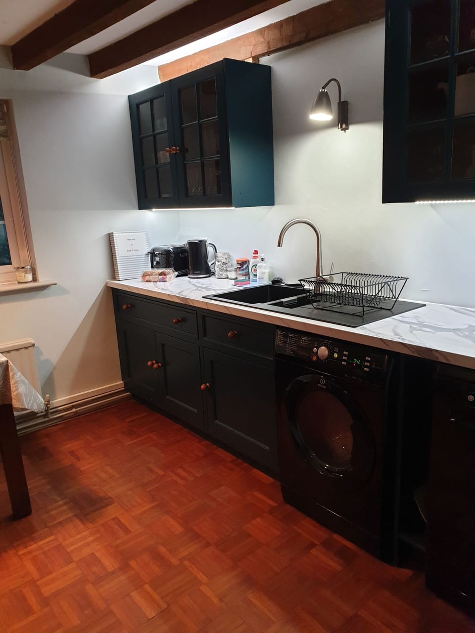 Beamed kitchen with microwave,  dishwasher, fridge/freezer, double oven & hob.