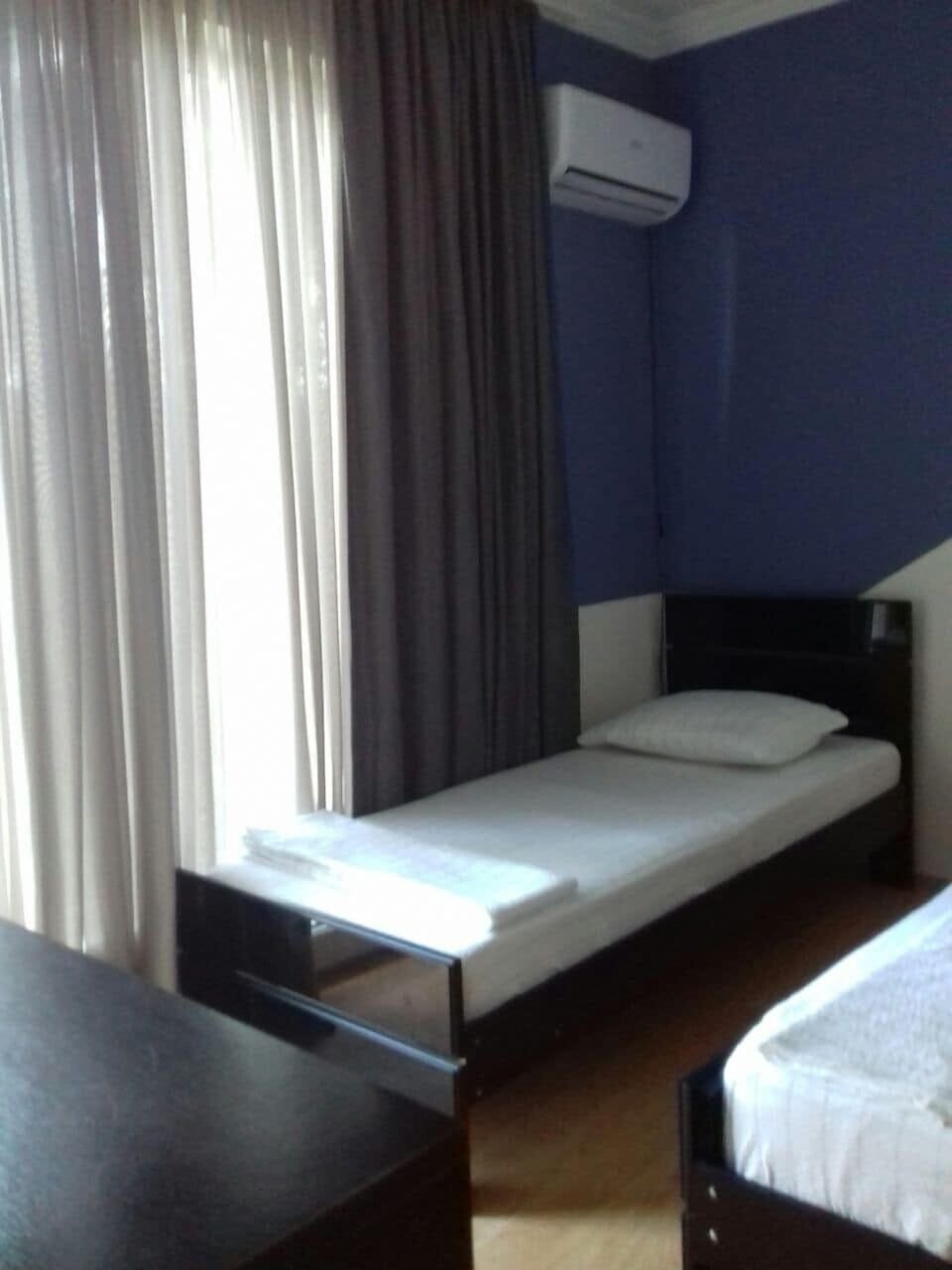 Family Triple Room, Balcony, Sea View | Iron/ironing board, free WiFi, bed sheets