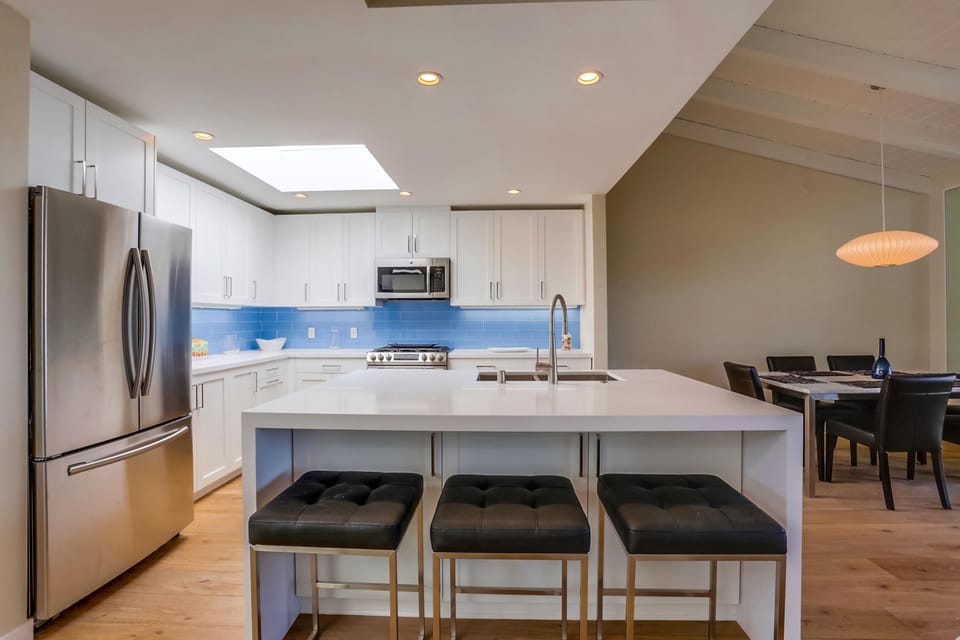 The oversized island offers plenty of room for meals and conversation.