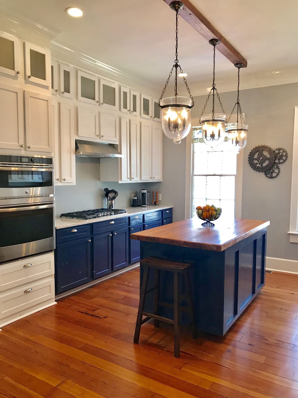Kitchen with 5-burner gas stove and Nespresso coffee maker--we supply a few pods