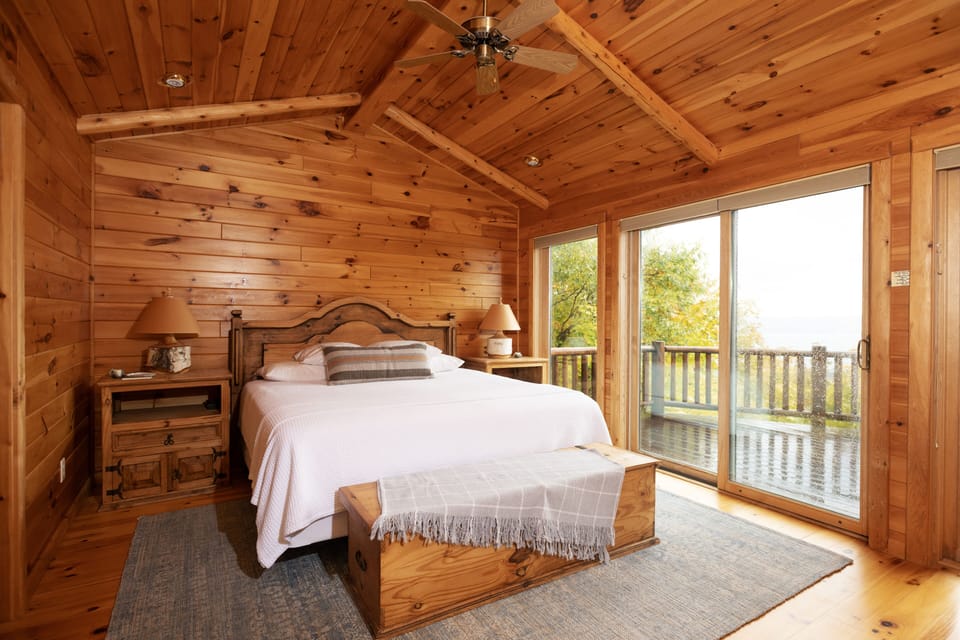Main floor master bedroom with lake views