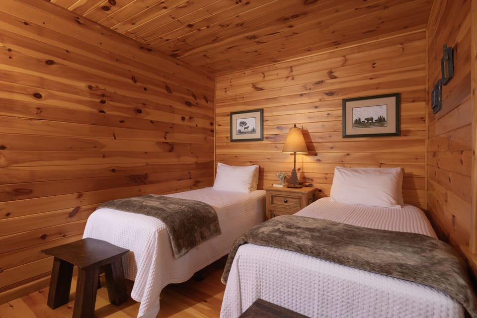 Guest bedroom with 2 XL twin beds, ample closet storage