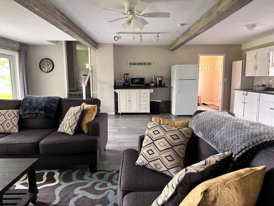 View from living room. Outside door on right, stairs on left to bedroom & bath.