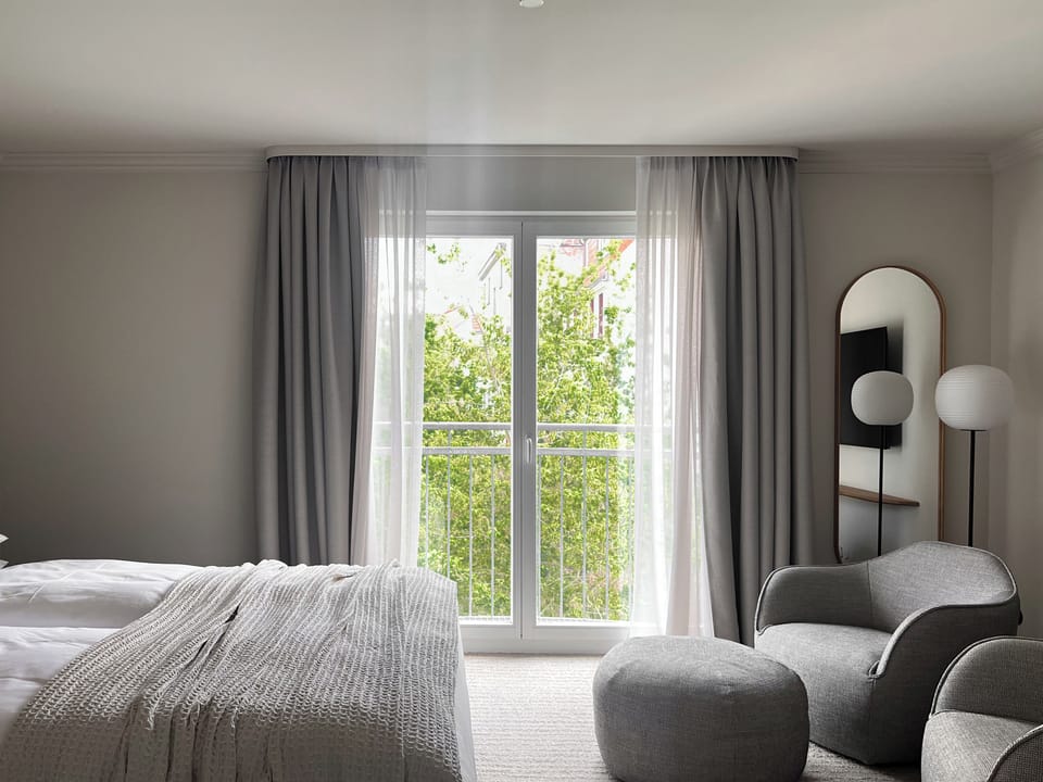 Premium bedding, down comforters, minibar, in-room safe