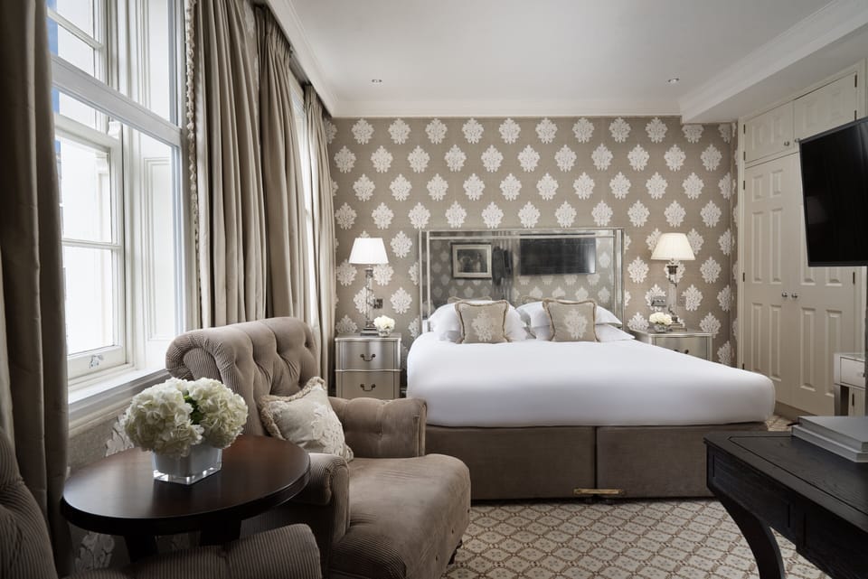 Deluxe King | Premium bedding, in-room safe, individually decorated