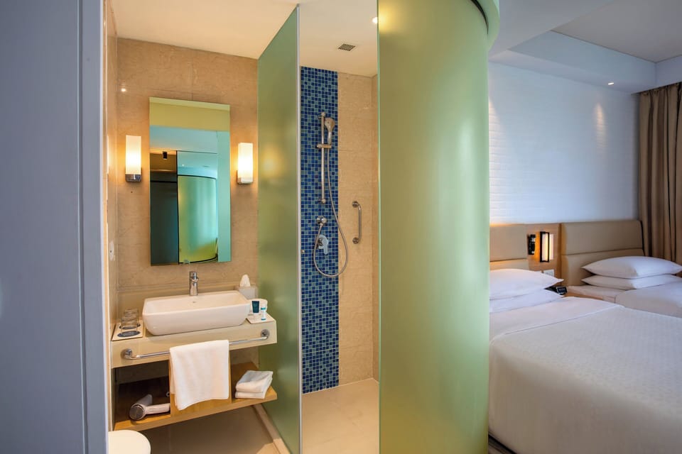 Room, 2 Twin Beds | Bathroom | Shower, free toiletries, hair dryer, slippers