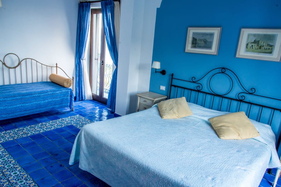 Suite with Sea View | Minibar, in-room safe, desk, free WiFi