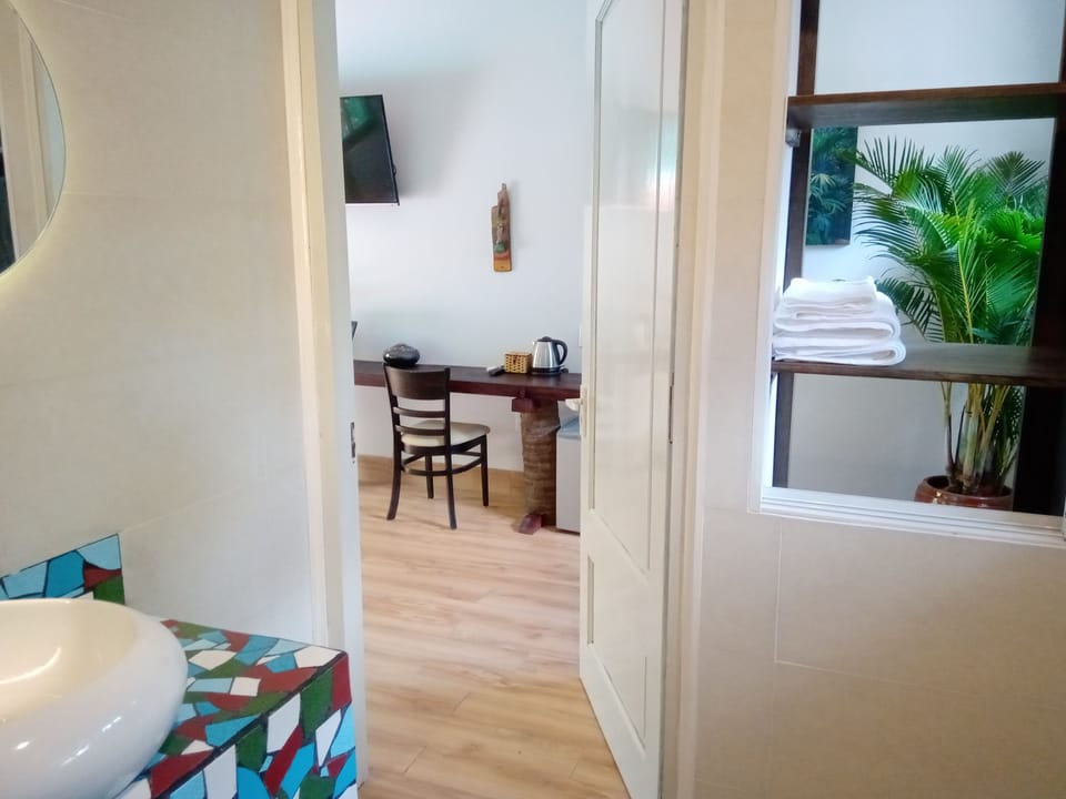 Standard Double Room (La Dolce Vita) | Bathroom | Shower, free toiletries, hair dryer, slippers