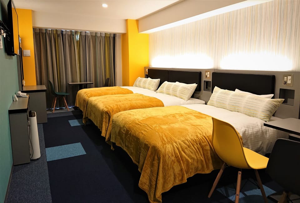 Triple Room, Non Smoking | Down comforters, desk, blackout drapes, WiFi (free)