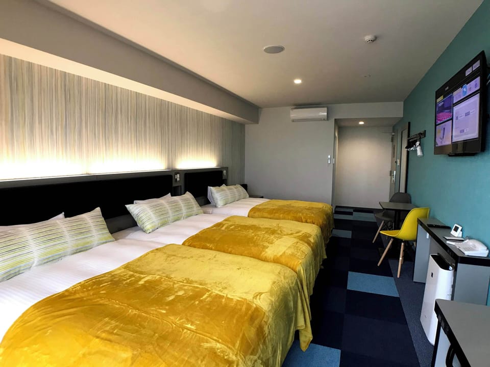 Triple Room, Non Smoking | Down comforters, desk, blackout drapes, WiFi (free)