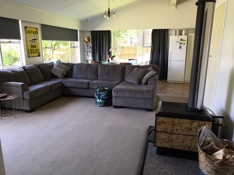 Relax on the sofa and in the cold months watch the fire with a glass or two.