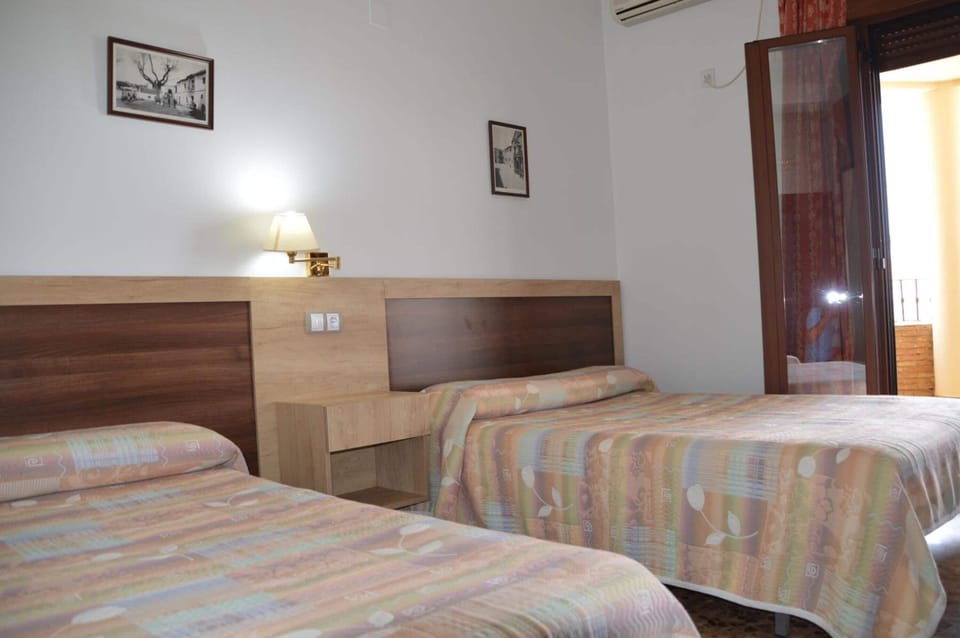 Blackout drapes, WiFi (free), bed sheets