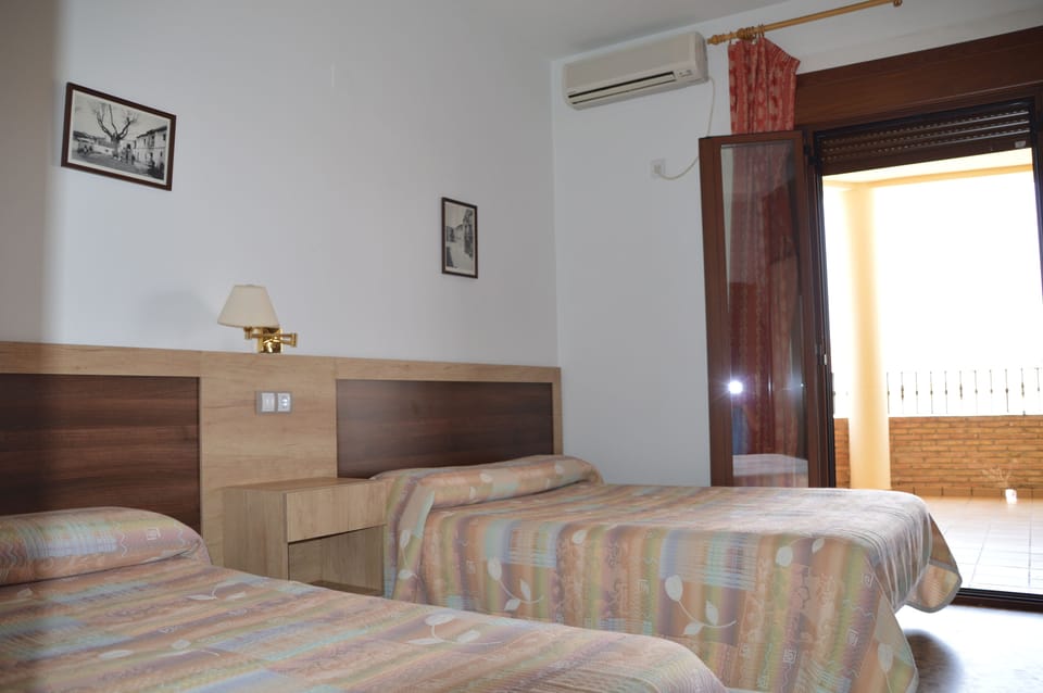 Basic Double Room, Multiple Beds, Balcony, Mountain View | Blackout drapes, WiFi (free), bed sheets