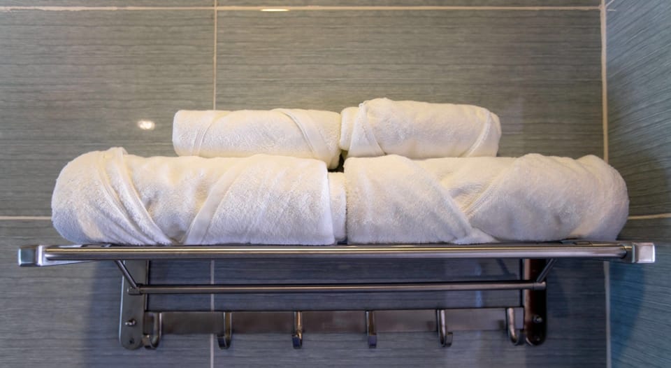 Shower, free toiletries, hair dryer, slippers