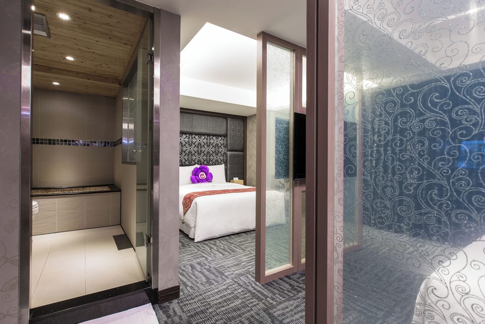 Deluxe Quadruple Room, 2 Queen Beds | Free minibar, in-room safe, desk, soundproofing