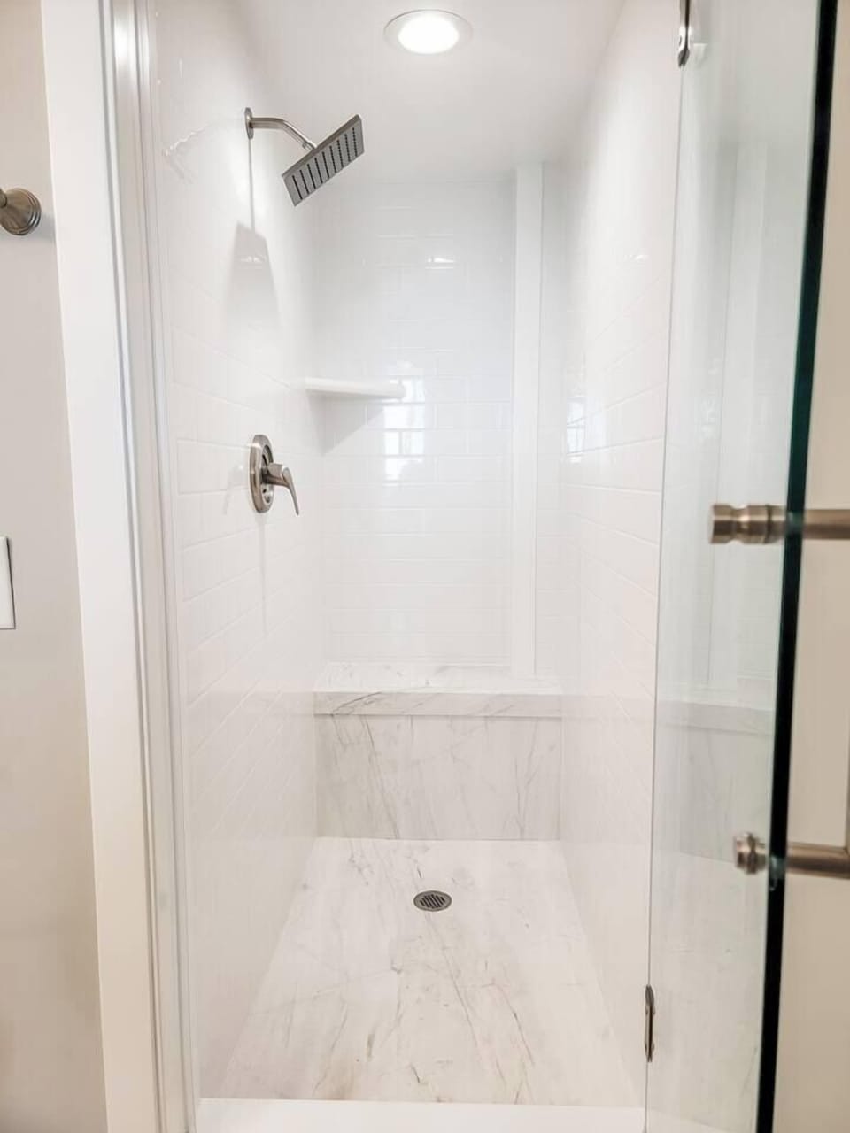 Primary bathroom - walk-in shower with bench seat!