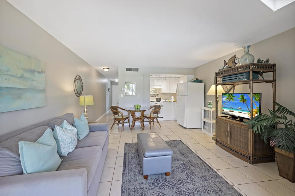 Condo, 1 King Bed with Sofa bed (Idyllic inland condo with pool and be) | Living area | Flat-screen TV