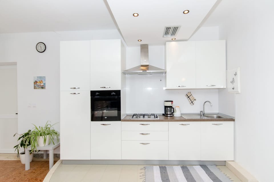Villa | Private kitchen | Espresso maker, fridge, microwave, oven