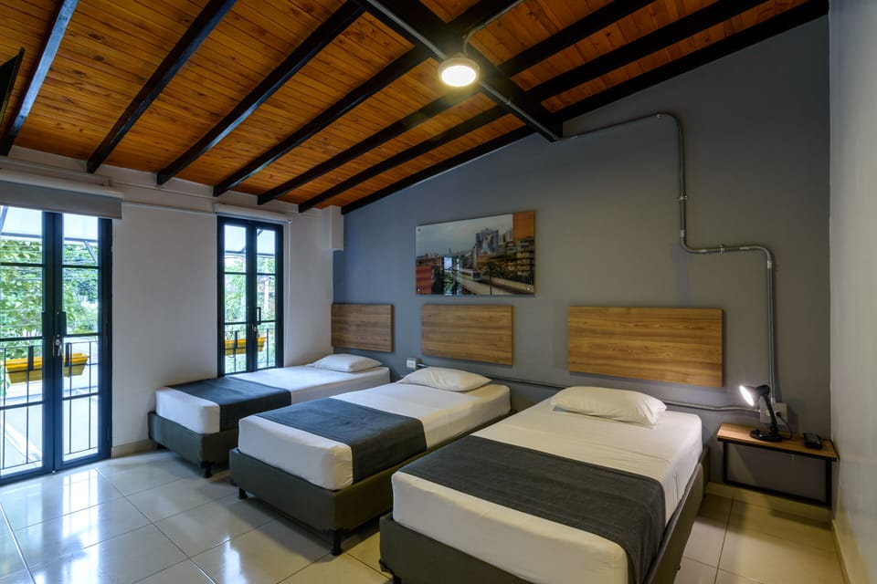 Family Triple Room | Hypo-allergenic bedding, pillowtop beds, individually decorated