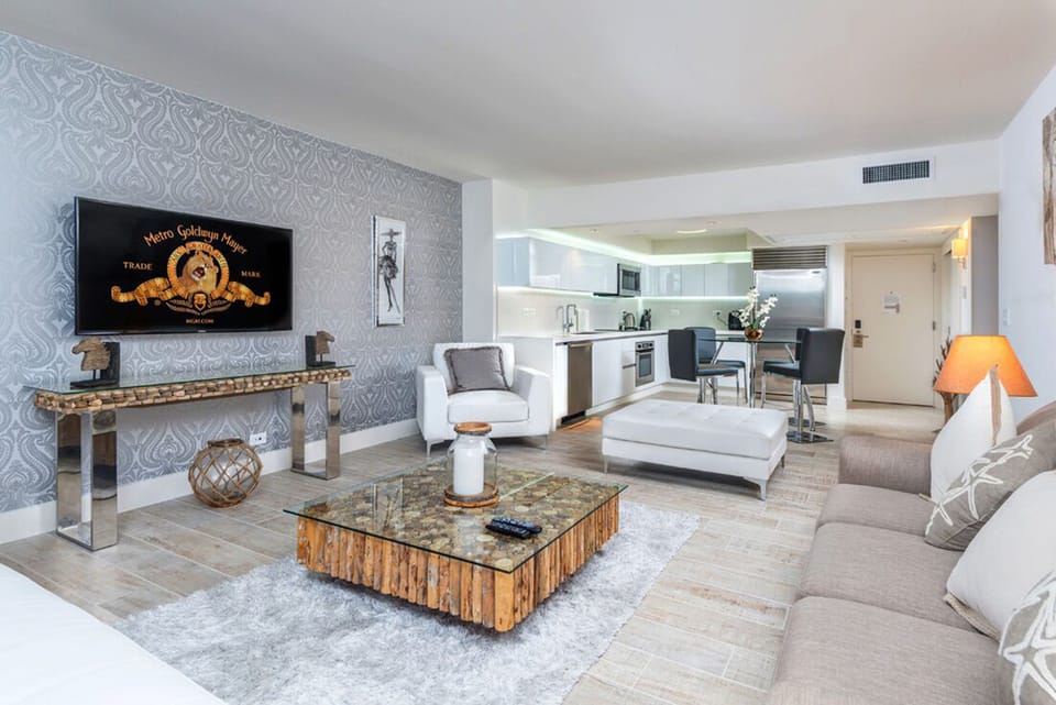 Premier Condo, 1 Bedroom, Balcony, Ocean View (11L08) | Living room | 42-inch flat-screen TV with digital channels, TV