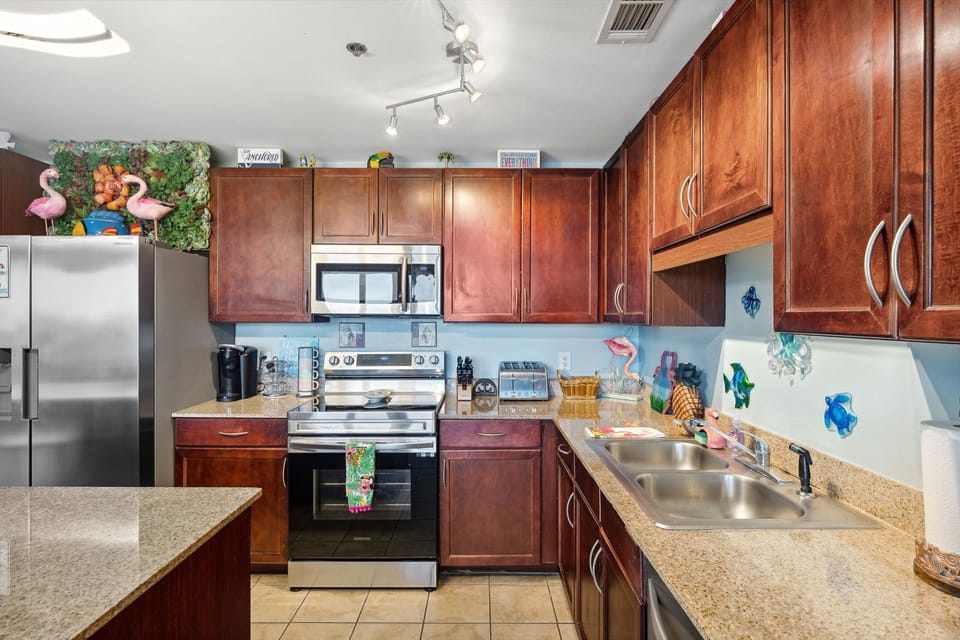  There is an Air fryer, a Keurig Coffee Maker, Electric teapot.