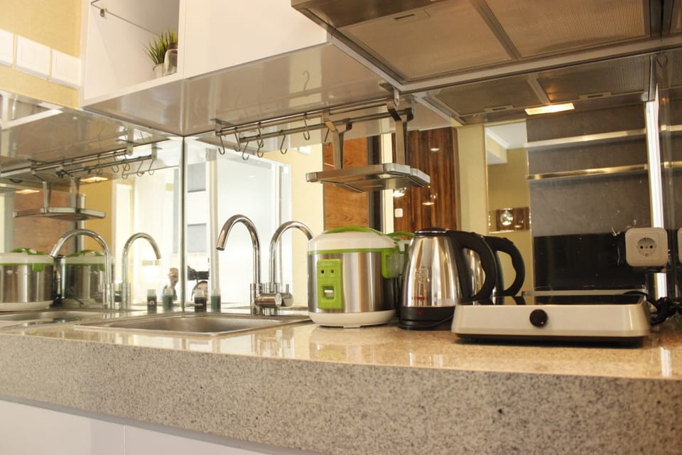 Room | Private kitchen | Fridge, stovetop, electric kettle, cookware/dishes/utensils