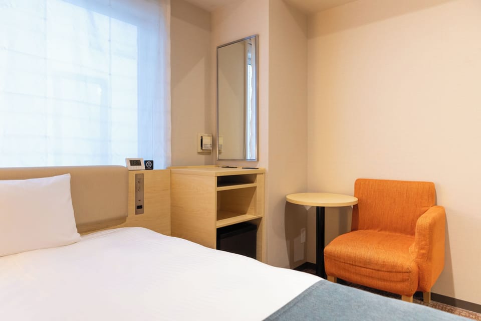 Desk, free WiFi, bed sheets