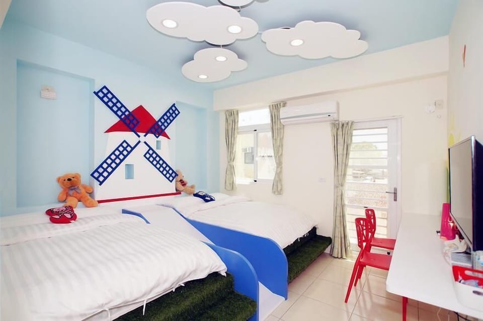Quadruple Room, Patio | Individually decorated, blackout drapes, iron/ironing board, free WiFi