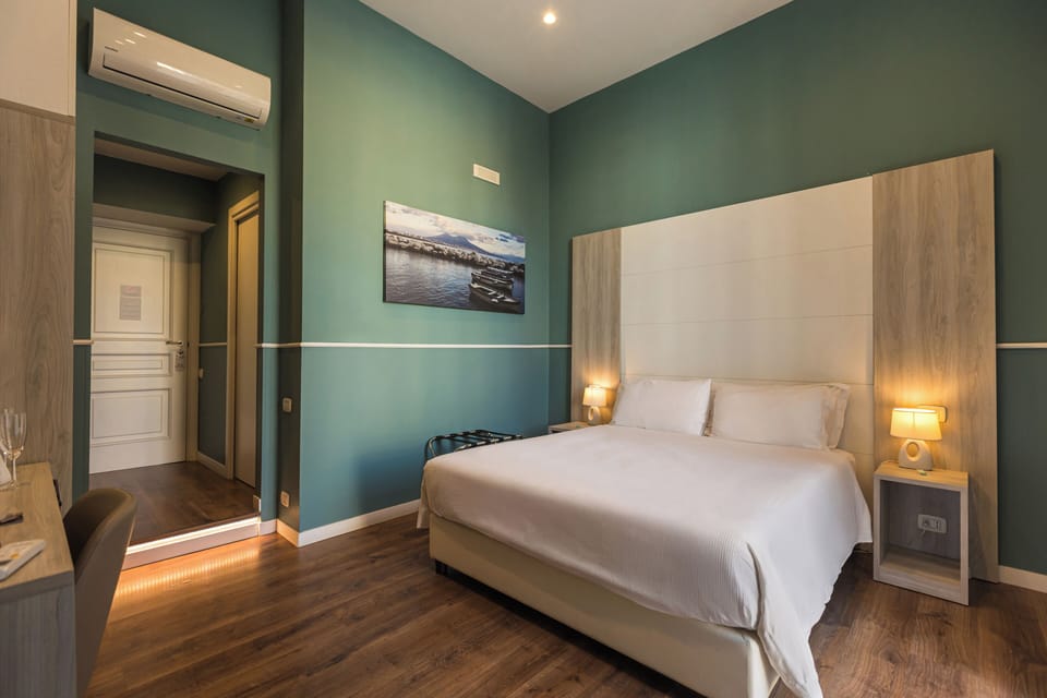 Superior Double Room, Jetted Tub | Minibar, in-room safe, individually decorated, desk