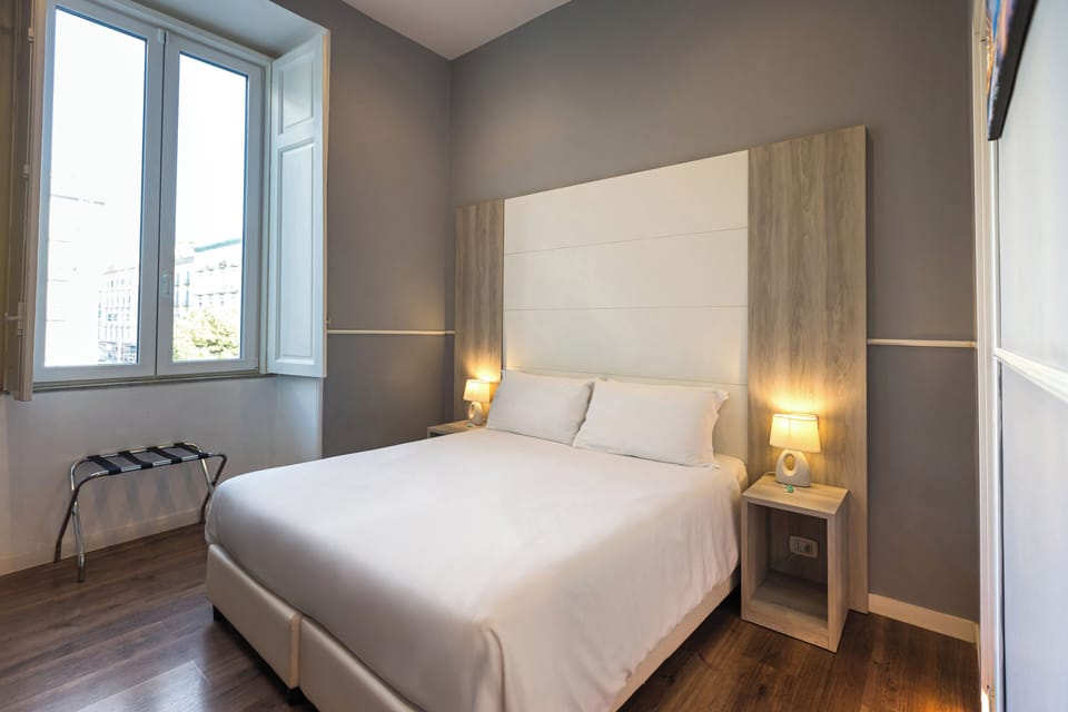Deluxe Double Room | Minibar, in-room safe, individually decorated, desk