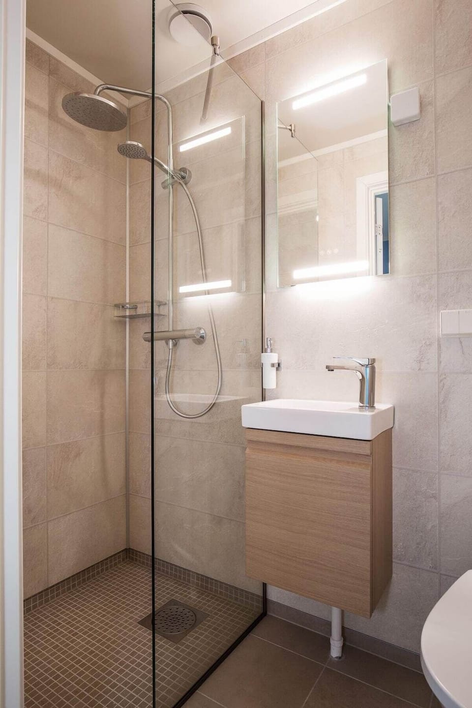 Shower, towels, soap, toilet paper