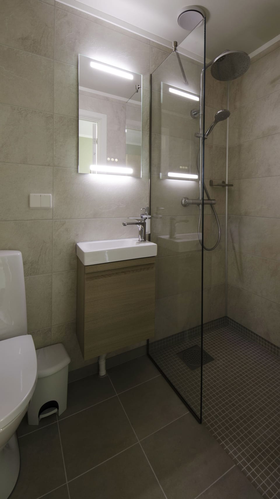 Shower, towels, soap, toilet paper