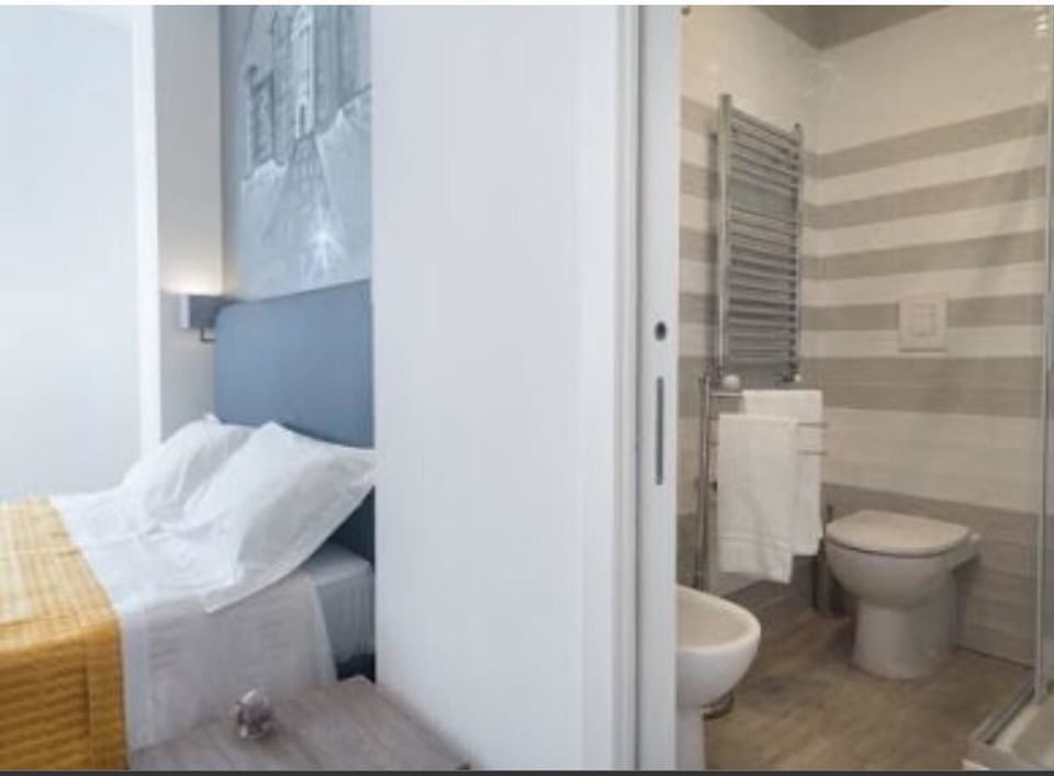 Double or Twin Room, City View | Minibar, desk, soundproofing, iron/ironing board