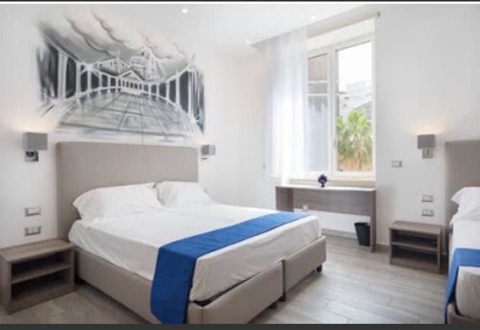 Triple Room | Minibar, desk, soundproofing, iron/ironing board