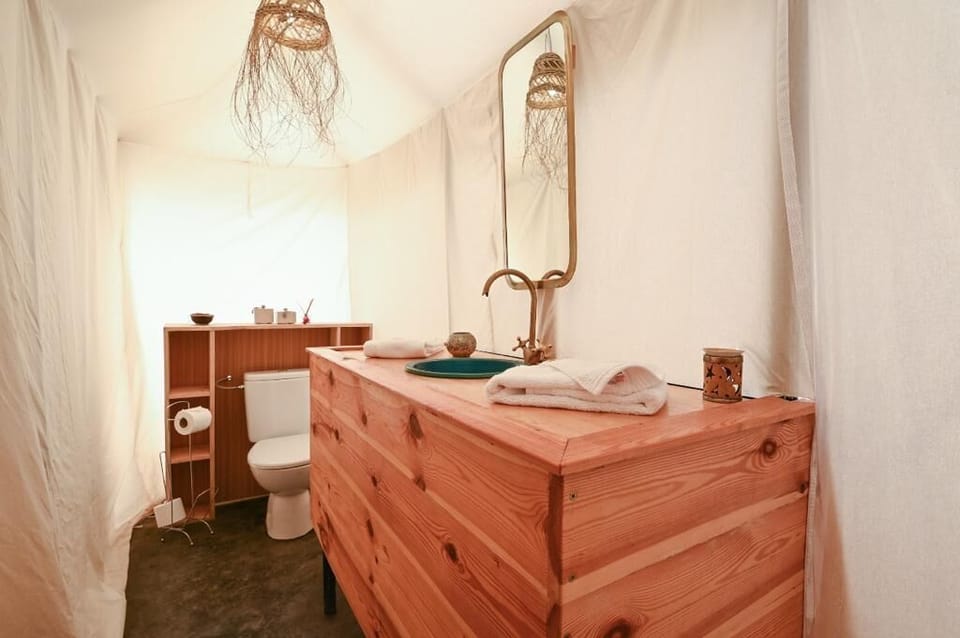 Shower, rainfall showerhead, towels, soap