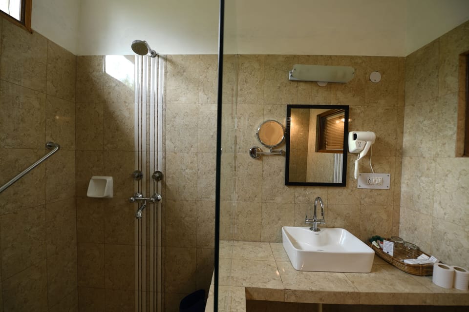 Designer toiletries, hair dryer, bathrobes, slippers