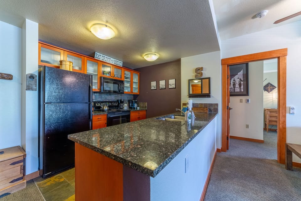 Kitchen with granite countertops.