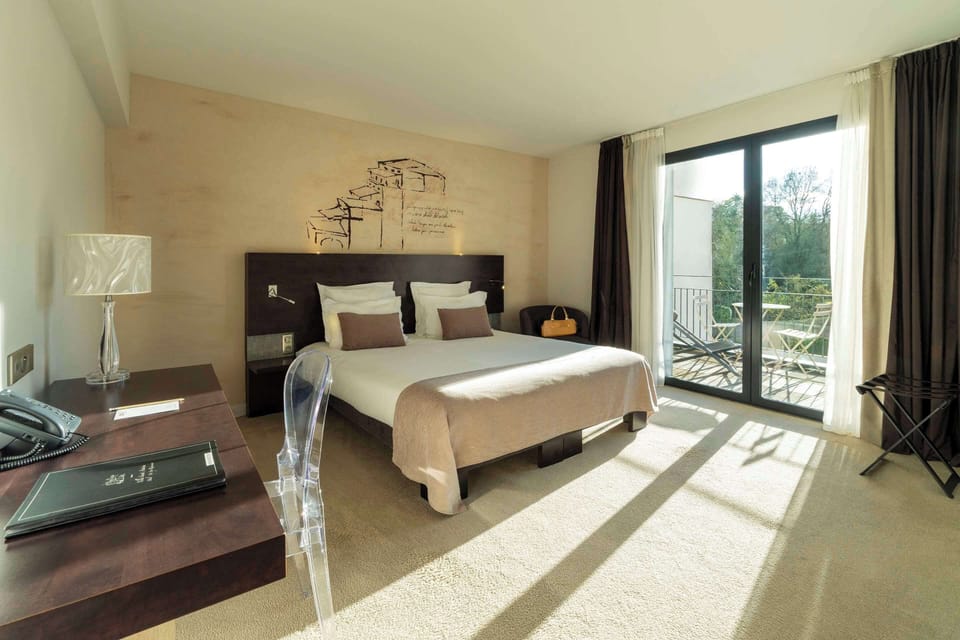 Exclusive Room, 1 King Bed, Non Smoking, Terrace | In-room safe, individually decorated, individually furnished, desk
