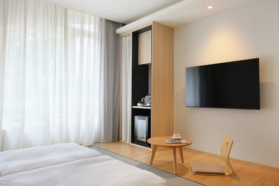 Japanese-style Twin Room, City View | Premium bedding, down comforters, pillowtop beds, free minibar