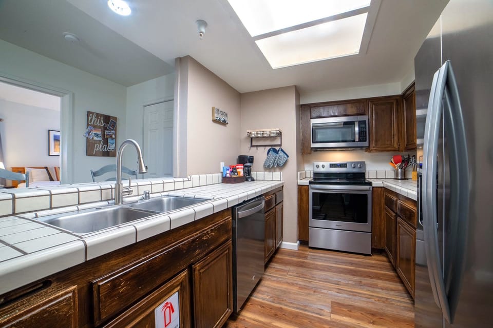 Kitchen with stainless steel appliances.