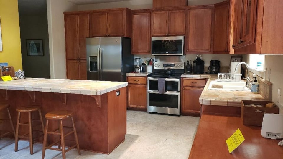 Large kitchen with plenty of storage.
