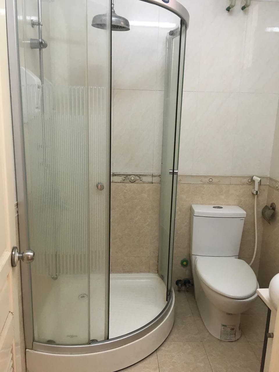Shower, free toiletries, hair dryer, slippers