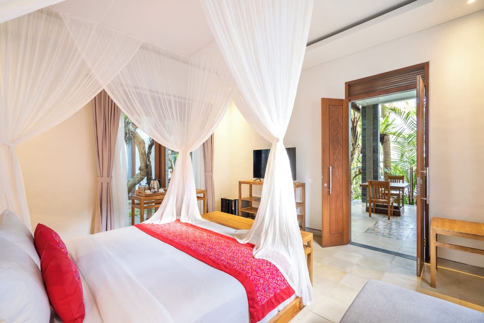 Romantic Suite, 1 Bedroom, Pool View | Minibar, desk, laptop workspace, free WiFi