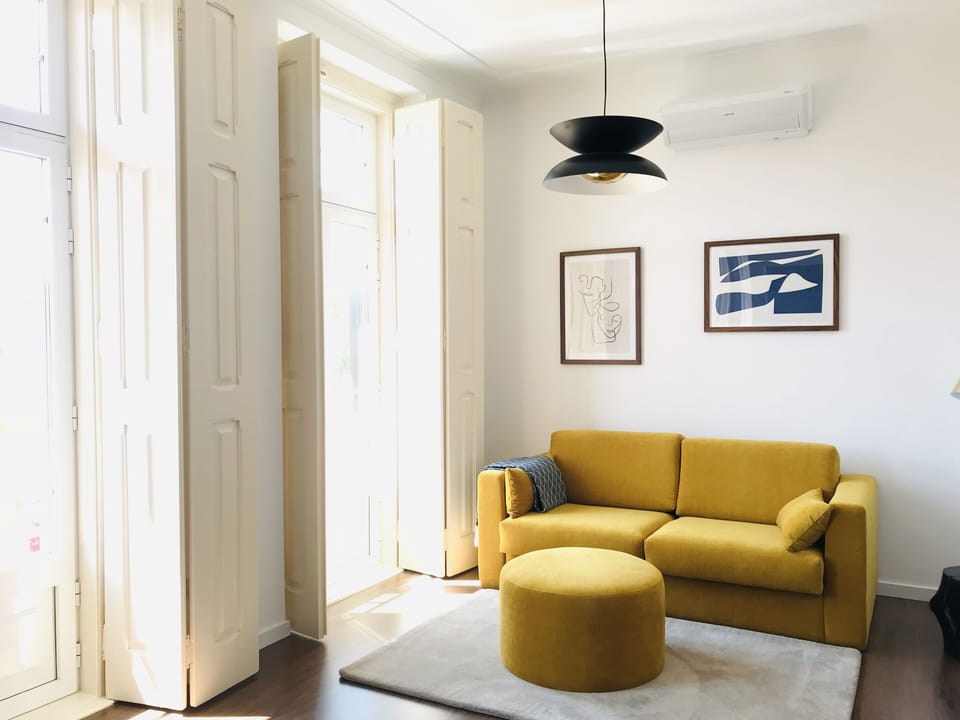 Deluxe Double Room, Pool View | Living area | Flat-screen TV