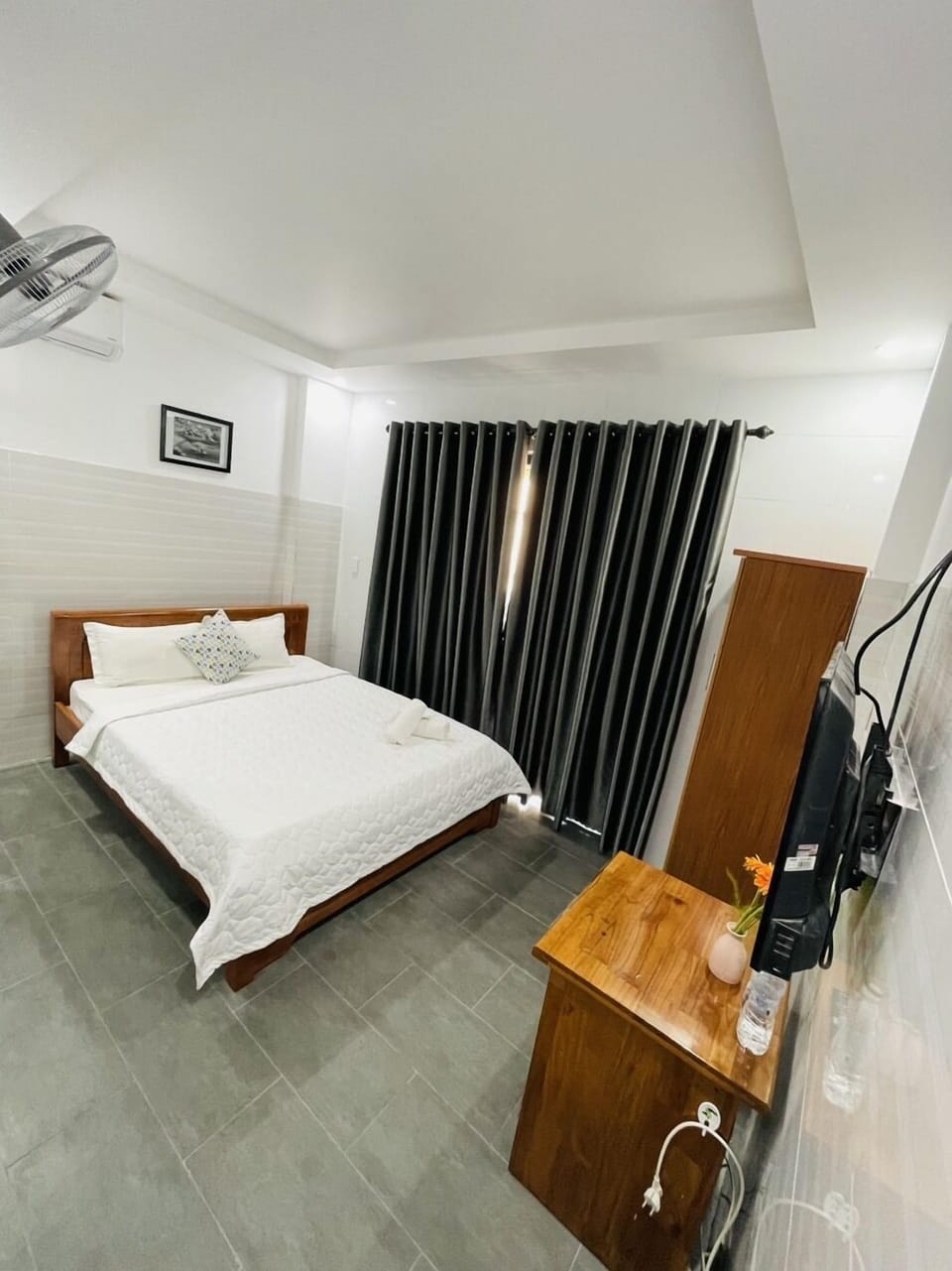 Deluxe Room, Balcony | Minibar, desk, laptop workspace, iron/ironing board