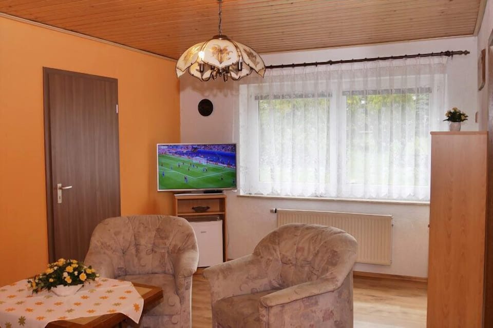 Double Room | Living area | Flat-screen TV